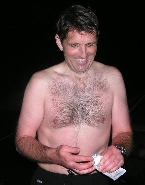 Q without a shirt