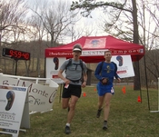 Joe Clapper and Greg Loomis finishing Bel Monte 50 Mile